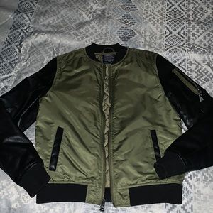 Olive green and black bomber jacket